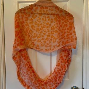 Infinity scarf. Lightweight poly. Pretty tangerine print.